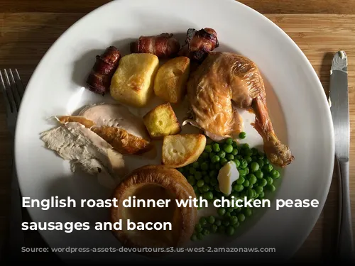 English roast dinner with chicken pease potatoes sausages and bacon