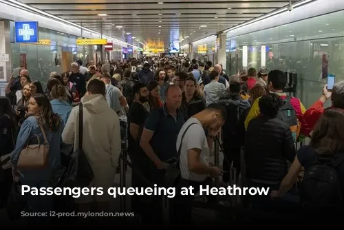 Passengers queueing at Heathrow security