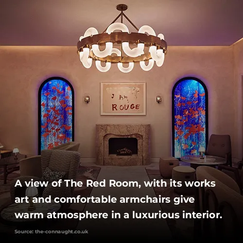 A view of The Red Room, with its works of art and comfortable armchairs give a warm atmosphere in a luxurious interior.