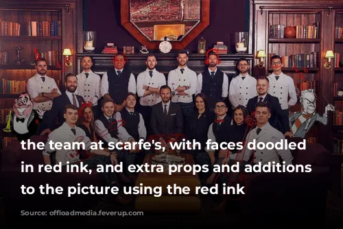 the team at scarfe's, with faces doodled over in red ink, and extra props and additions made to the picture using the red ink