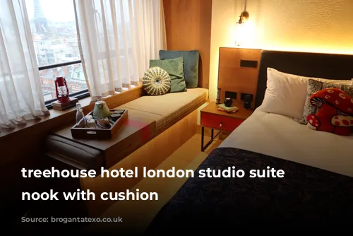 treehouse hotel london studio suite window nook with cushion