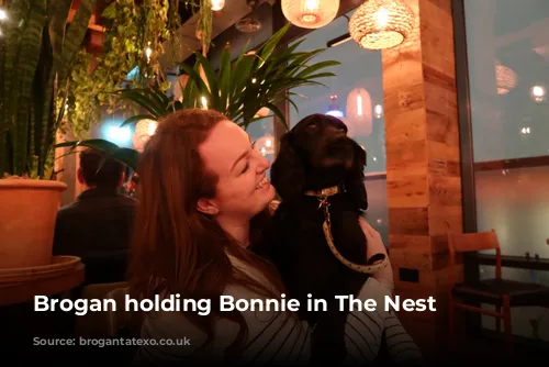 Brogan holding Bonnie in The Nest Bar 