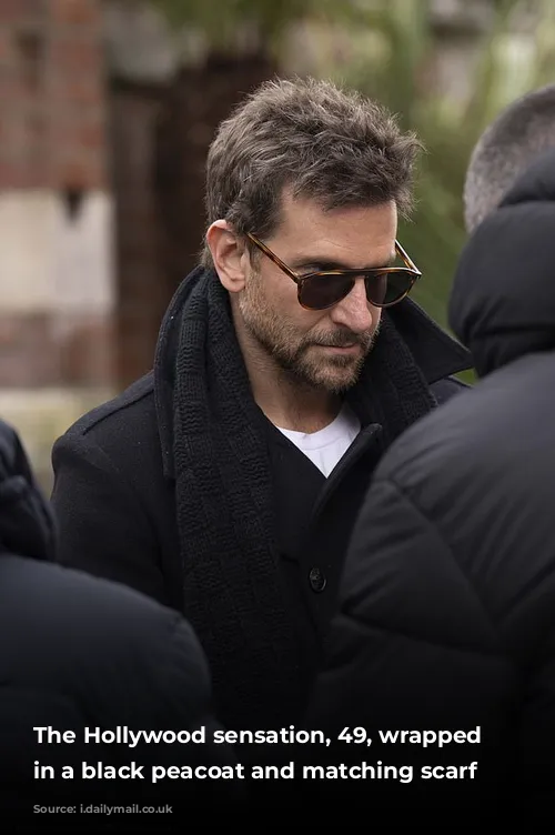 The Hollywood sensation, 49, wrapped up in a black peacoat and matching scarf