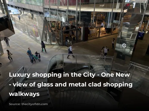 Luxury shopping in the City - One New Change - view of glass and metal clad shopping centre walkways