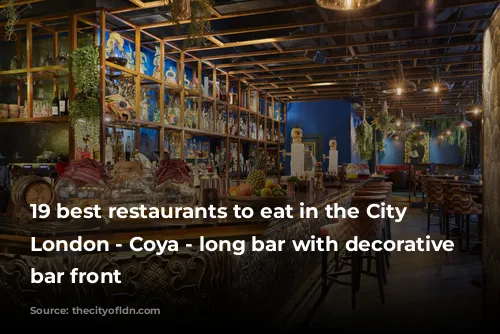 19 best restaurants to eat in the City of London - Coya - long bar with decorative patterened bar front