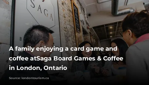 A family enjoying a card game and drinking coffee atSaga Board Games & Coffee located in London, Ontario