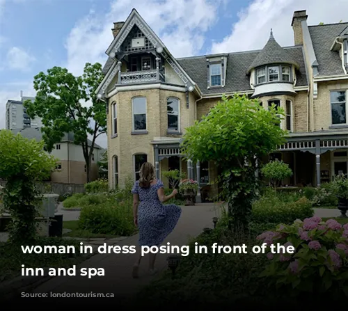 woman in dress posing in front of the Idlewyld inn and spa