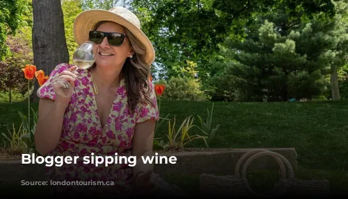 Blogger sipping wine