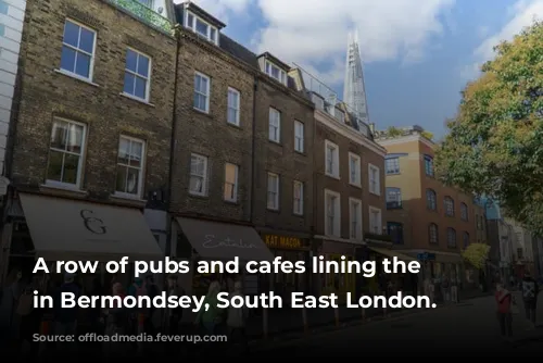 A row of pubs and cafes lining the street in Bermondsey, South East London.