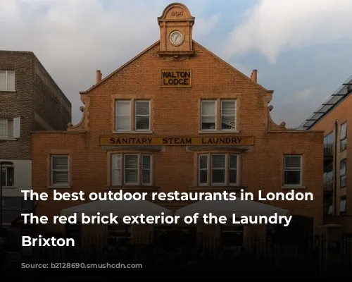 The best outdoor restaurants in London | The red brick exterior of the Laundry in Brixton