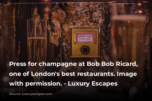 Press for champagne at Bob Bob Ricard, Soho, one of London's best restaurants. Image used with permission.
- Luxury Escapes