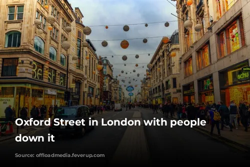 Oxford Street in London with people shopping down it 