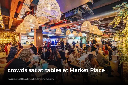 crowds sat at tables at Market Place Peckham