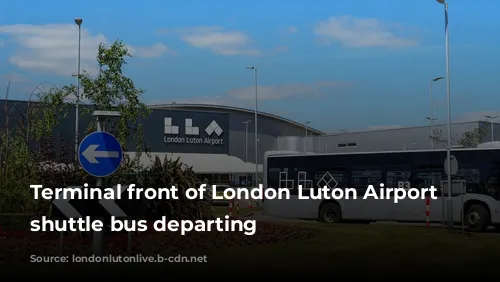 Terminal front of London Luton Airport with shuttle bus departing