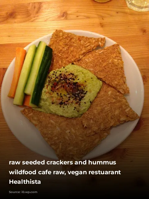 raw seeded crackers and hummus at wildfood cafe raw, vegan restuarant by Healthista