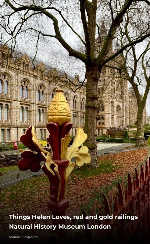 Things Helen Loves, red and gold railings outside Natural History Museum London