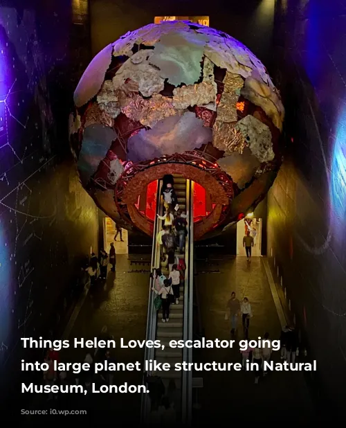 Things Helen Loves, escalator going up into large planet like structure in Natural History Museum, London.