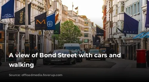 A view of Bond Street with cars and pedestrians walking