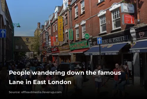 People wandering down the famous Brick Lane in East London